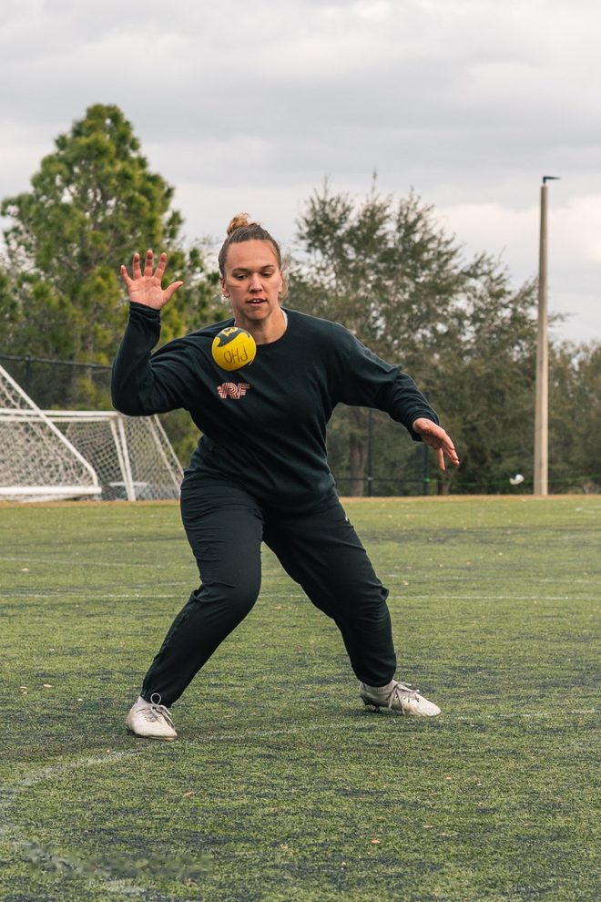 A player throwing into the play-in round